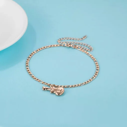 Rose Gold Bracelet With A Guitar Pendant - Image 5
