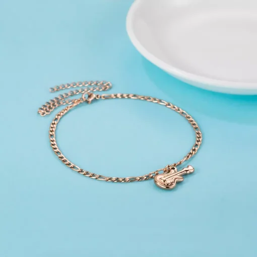 Rose Gold Bracelet With A Guitar Pendant - Image 3