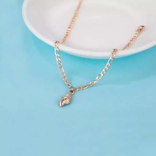 Rose Gold Bracelet With A Shell Pendant - Image 4