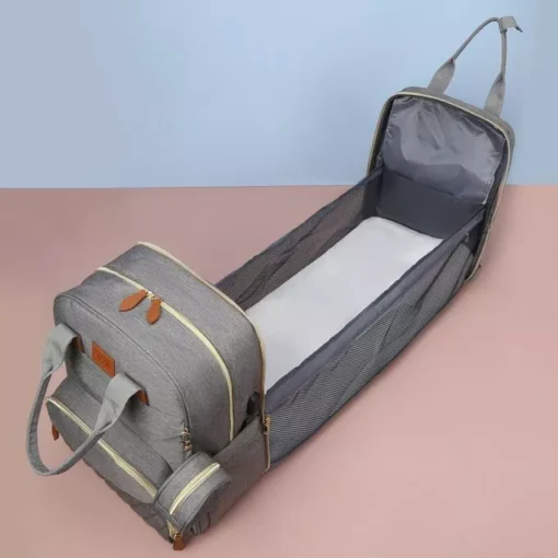3-in-1 Diaper Bag Backpack with Foldable Baby Bed - Image 4
