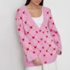 Women’s Oversized V-Neck Knitted Cardigan with Heart Print